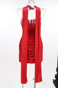 Back view of a red strapless satin mini dress with corset lace-up and long ribbons