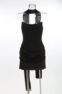 Elegant black strapless bodycon cocktail dress with draped skirt details on mannequin