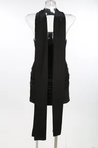 Detail of black strapless bodycon dress with draped scarf neck and ruched side details.