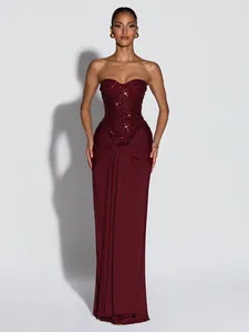 Elegant wine red sequin strapless evening gown with draped pleated skirt detail