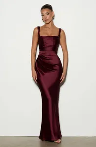 Elegant burgundy satin evening gown with sophisticated pleating detail and slim fit