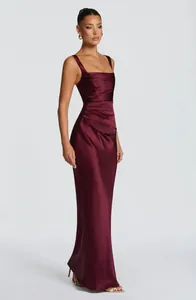 Elegant burgundy satin evening gown with square neckline and ruched waist detail