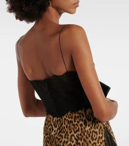 Detailed back view of a sexy leopard print maxi dress with black lace bodice and thin straps.