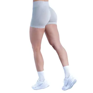 Seamless high-waist yoga shorts with butt-lifting ruched design in light grey color