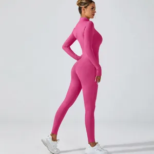 Combinaison de yoga rose à manches longues pour femmes avec une fermeture éclair