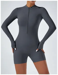 Detail of a grey long sleeve zip-front bodysuit for professional yoga and fitness
