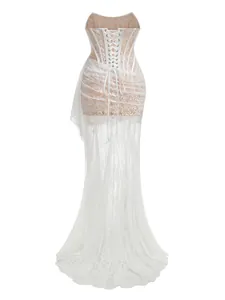 Detailed back view of white lace sheer maxi dress featuring corset lace-up closure