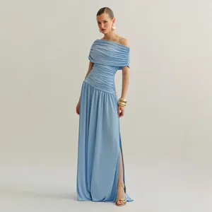 Elegant light blue off-the-shoulder ruched maxi dress with high slit for evening events.