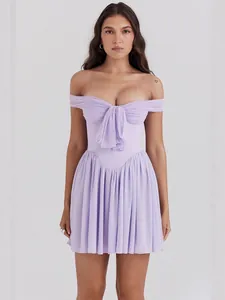 Detailed view of lavender off-shoulder pleated mesh dress with front bow tie