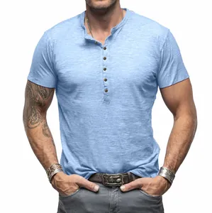 Detail of light blue short sleeve Henley shirt in textured slub cotton fabric