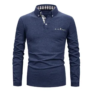 Detail view of men's blue long sleeve polo shirt with plaid patterned collar and pocket trim