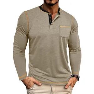 Detail view of men's khaki long sleeve Henley shirt with 4-button placket and chest pocket