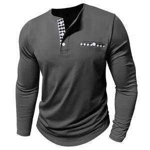 Close-up detail of grey men's long sleeve Henley shirt with stylish checkered trim