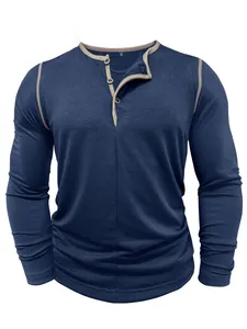 Front detail of men's dark blue Henley shirt featuring contrast trim and buttons