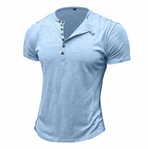 Detailed view of men's light blue casual Henley shirt with buttoned collar detail.