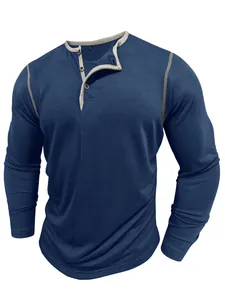 Men's blue long sleeve Henley shirt with contrast neck trim and button placket detail.