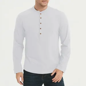 Close-up view of a classic white long-sleeved cotton Henley shirt featuring five brown buttons