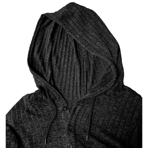Close-up detail of black ribbed men's long-sleeve hoodie with button placket