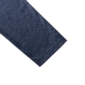 Close-up of men's polo shirt sleeve cuff showing heathered fabric and fine stitching