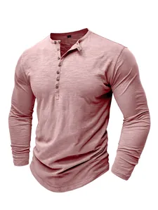 Men's dusty pink long sleeve Henley t-shirt in slub cotton texture, front view details