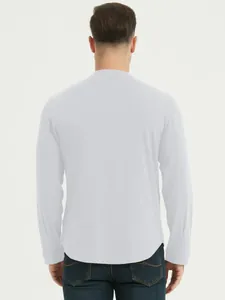 Rear view of a white long-sleeved cotton Henley shirt showing its curved hemline