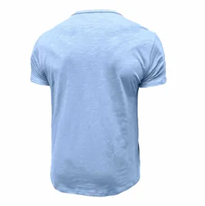 Back view detail of a light blue slub cotton short sleeve t-shirt with natural texture
