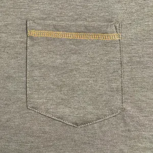 Detail view of a heathered brown garment pocket featuring decorative orange contrast stitching.
