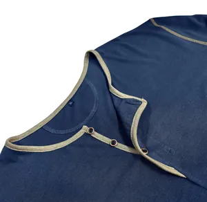 Close-up of a men's navy blue Henley shirt neckline with contrast trim and buttons