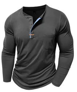 Close-up detail of men's dark grey long sleeve Henley shirt with contrast blue placket
