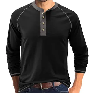 Close-up of black men's long-sleeved Henley shirt with grey contrast collar and stitching.