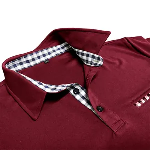 Close-up of men's burgundy polo shirt featuring a gingham collar and chest pocket detail.