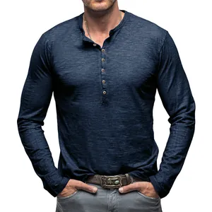 Close-up of a navy blue slub cotton Henley shirt for men with long sleeves and buttons