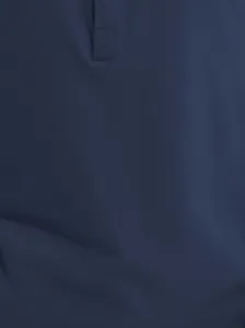 Close-up of navy blue cotton fabric and button placket on men's Henley shirt