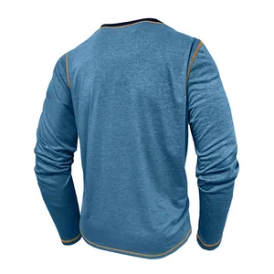 Back view of blue long-sleeved quick-dry t-shirt with orange stitching details