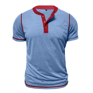 Detail view of blue heathered Henley shirt with red contrast trim and front pocket