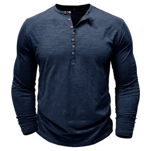 Detailed view of navy slub cotton men's Henley shirt showing fabric texture and buttons