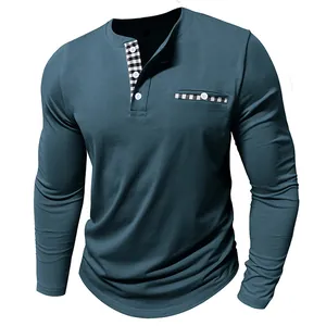 Detail view of men's teal long-sleeved Henley shirt with contrast plaid placket details