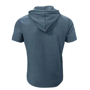 Back view of men's blue ribbed short sleeve hoodie T-shirt with textured fabric