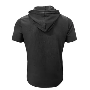 Detailed back view of a black men's short sleeve hooded T-shirt featuring a ribbed texture