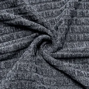 Detailed macro shot of grey ribbed knit fabric texture for men's hooded casual shirt