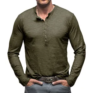 Detail shot of a men's long-sleeve slub cotton Henley shirt in army green color
