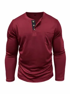 Detail view of a wine red men's long-sleeved Henley t-shirt with a front pocket