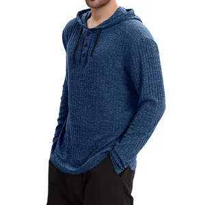 Close-up detail of blue ribbed long sleeve hooded t-shirt featuring button placket