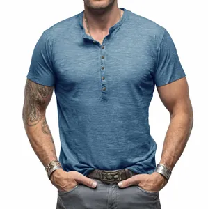 Front view of men's blue slub cotton Henley short sleeve shirt with button placket