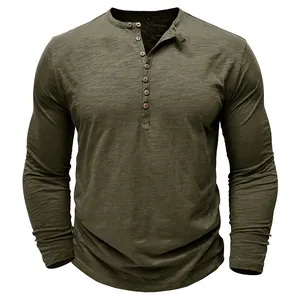 Close-up detail of men's olive green long-sleeve Henley shirt in slub cotton