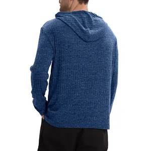 Back view of men's blue ribbed knit hoodie showing hood detail and fabric texture