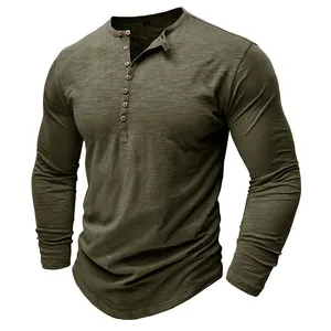 Detail of men's long sleeve slub cotton Henley shirt in olive green textured fabric