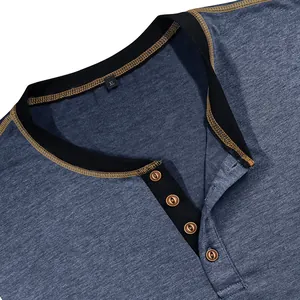 Detail of a men's blue heathered Henley shirt collar with buttons and contrast stitching