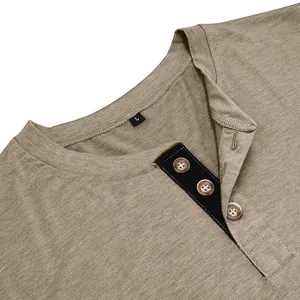Detail view of men's Henley collar shirt with three buttons and marled fabric texture.