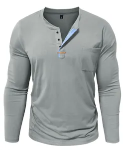 Men's grey long-sleeve Henley shirt featuring a contrast blue placket and pocket